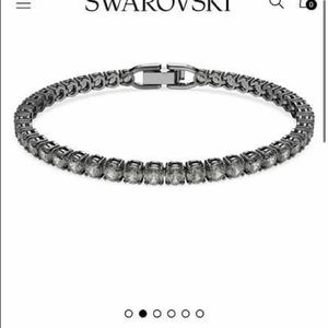 Swarovski tennis bracelet. Needs cleaned! Retails for $195